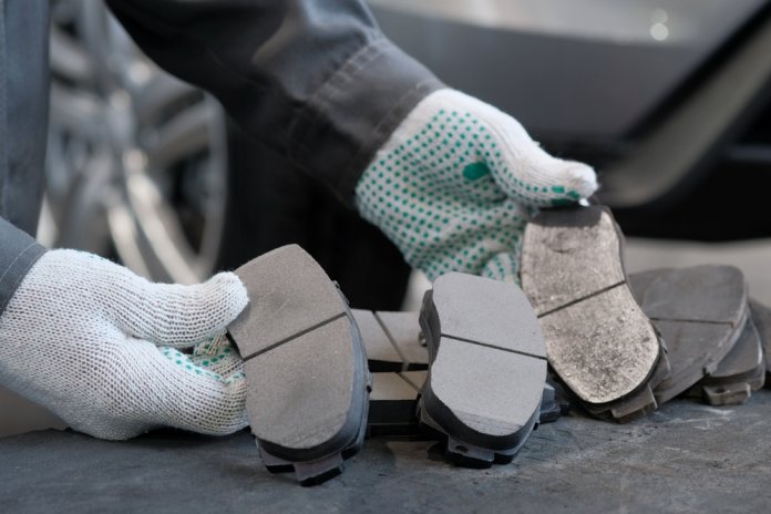 Car,Service.,Replacement,Of,The,Front,Brake,Pads.,An,Auto